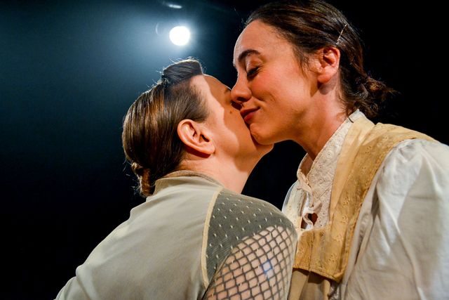 Jane and Helen share
an ambiguous and innocent kiss.
