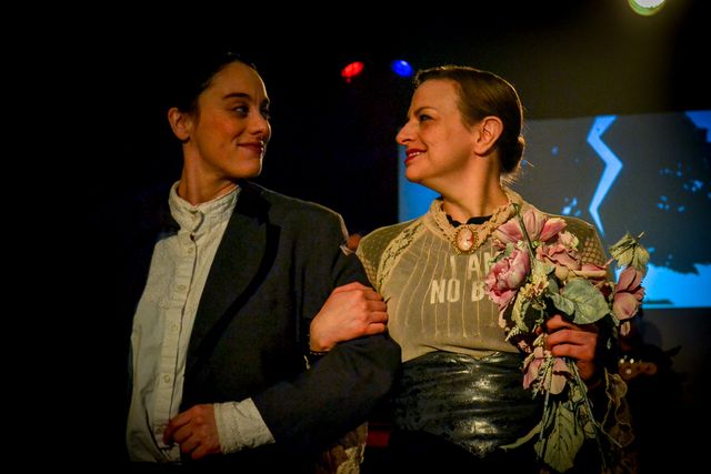 Jane carrying flowers,
arm-in-arm with Mr Rochester.
Behind them, a tree silhouette split down the middle.
