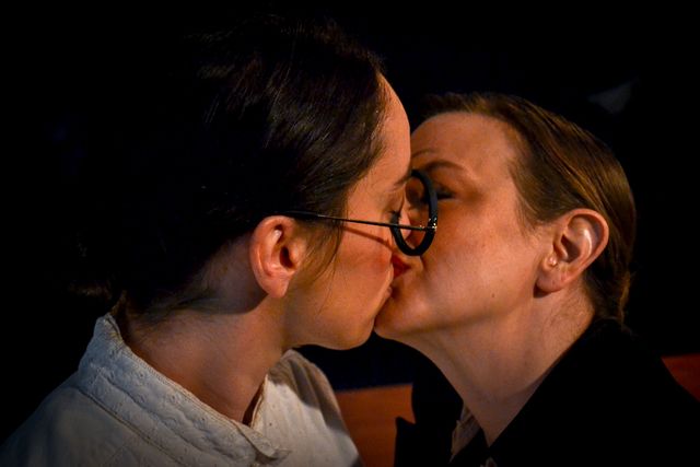Close up,
Jane and Diana kiss.
